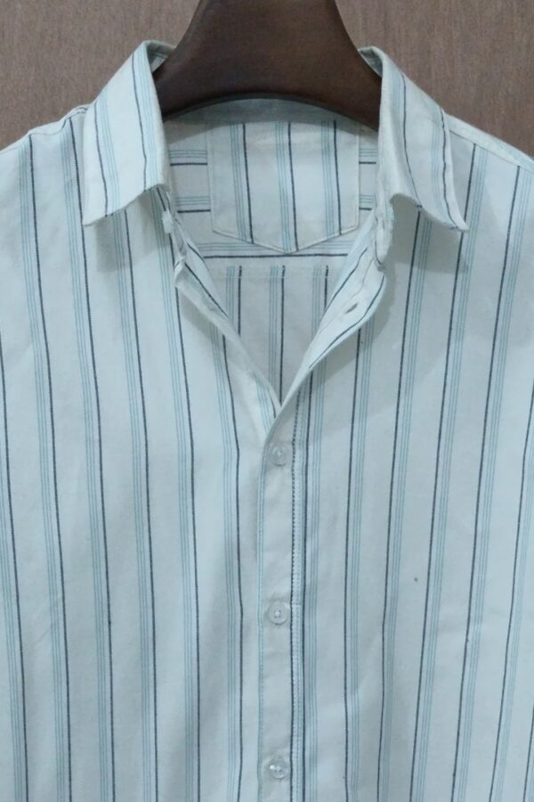 Off-White With Fine Teal Vertical Stripes